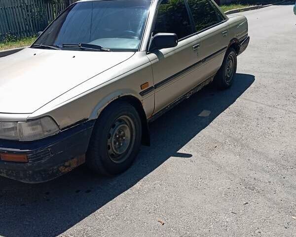 Бежевый Тойота Камри, объемом двигателя 2 л и пробегом 425 тыс. км за 1000 $, фото 8 на Automoto.ua