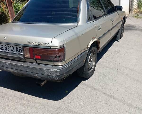 Бежевый Тойота Камри, объемом двигателя 2 л и пробегом 425 тыс. км за 1000 $, фото 4 на Automoto.ua