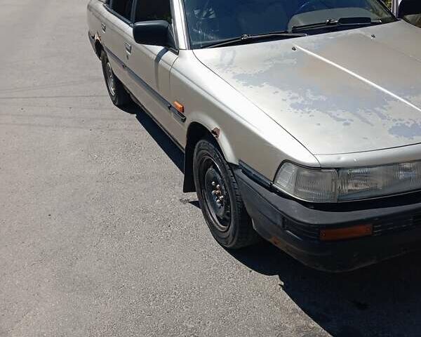 Бежевый Тойота Камри, объемом двигателя 2 л и пробегом 425 тыс. км за 1000 $, фото 2 на Automoto.ua