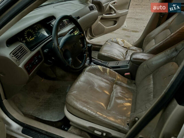 Бежевий Тойота Камрі, об'ємом двигуна 3 л та пробігом 360 тис. км за 2500 $, фото 16 на Automoto.ua