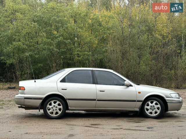 Бежевий Тойота Камрі, об'ємом двигуна 3 л та пробігом 360 тис. км за 2500 $, фото 8 на Automoto.ua