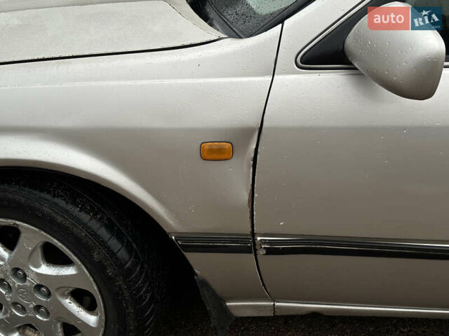 Бежевий Тойота Камрі, об'ємом двигуна 3 л та пробігом 360 тис. км за 2500 $, фото 13 на Automoto.ua