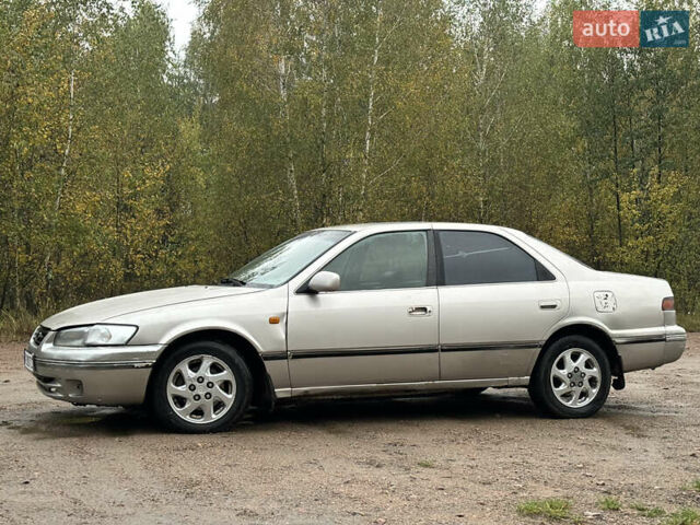 Бежевий Тойота Камрі, об'ємом двигуна 3 л та пробігом 360 тис. км за 2500 $, фото 4 на Automoto.ua