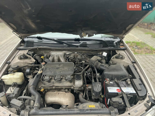 Бежевий Тойота Камрі, об'ємом двигуна 3 л та пробігом 350 тис. км за 3200 $, фото 7 на Automoto.ua