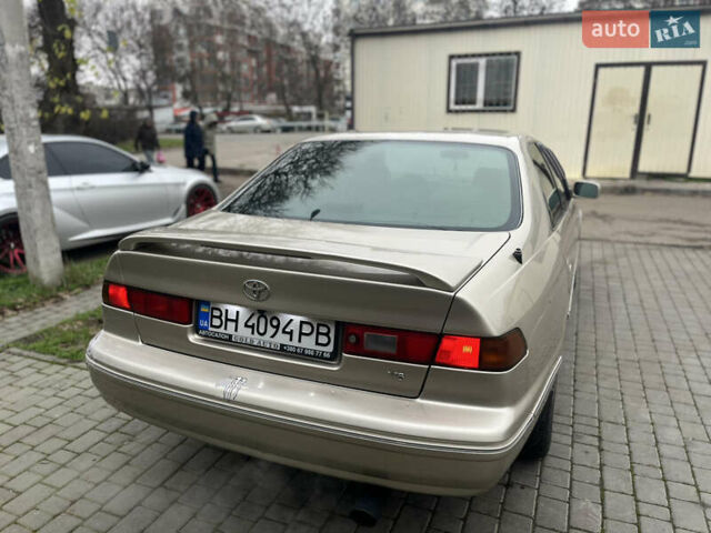 Бежевий Тойота Камрі, об'ємом двигуна 3 л та пробігом 350 тис. км за 3200 $, фото 2 на Automoto.ua