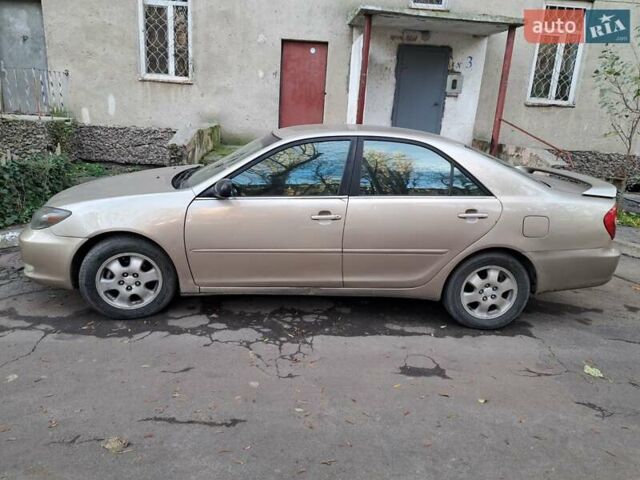 Бежевый Тойота Камри, объемом двигателя 2.36 л и пробегом 300 тыс. км за 5200 $, фото 12 на Automoto.ua