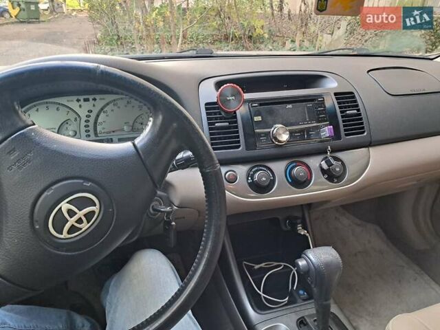 Бежевый Тойота Камри, объемом двигателя 2.36 л и пробегом 300 тыс. км за 5200 $, фото 9 на Automoto.ua