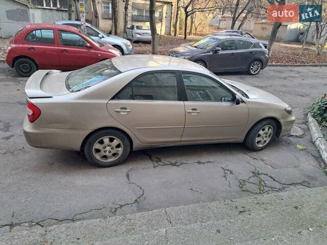 Бежевый Тойота Камри, объемом двигателя 2.36 л и пробегом 300 тыс. км за 5200 $, фото 1 на Automoto.ua