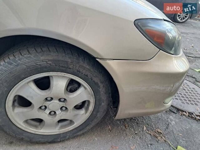 Бежевый Тойота Камри, объемом двигателя 2.36 л и пробегом 300 тыс. км за 5200 $, фото 4 на Automoto.ua