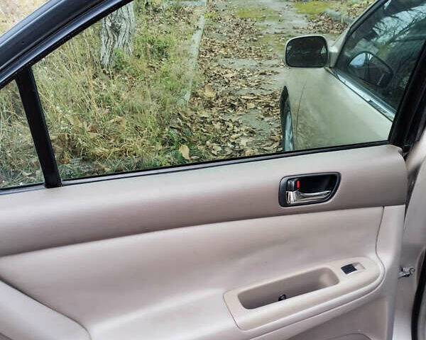 Бежевий Тойота Камрі, об'ємом двигуна 2.4 л та пробігом 290 тис. км за 5800 $, фото 16 на Automoto.ua