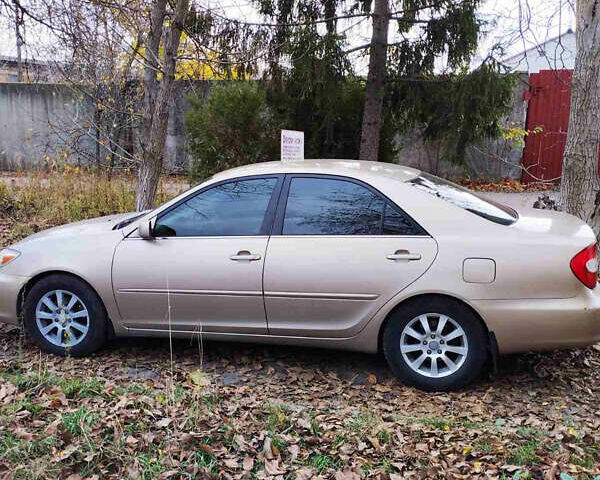 Бежевий Тойота Камрі, об'ємом двигуна 2.4 л та пробігом 290 тис. км за 5800 $, фото 8 на Automoto.ua