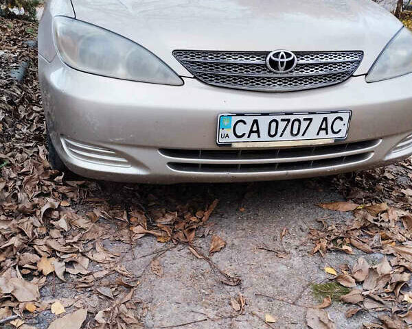 Бежевий Тойота Камрі, об'ємом двигуна 2.4 л та пробігом 290 тис. км за 5800 $, фото 7 на Automoto.ua