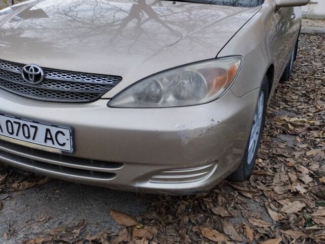 Бежевый Тойота Камри, объемом двигателя 2.4 л и пробегом 290 тыс. км за 5800 $, фото 1 на Automoto.ua