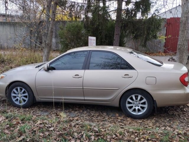 Бежевый Тойота Камри, объемом двигателя 2.4 л и пробегом 290 тыс. км за 5800 $, фото 6 на Automoto.ua