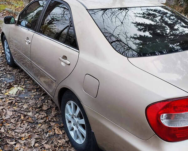 Бежевий Тойота Камрі, об'ємом двигуна 2.4 л та пробігом 290 тис. км за 5800 $, фото 4 на Automoto.ua