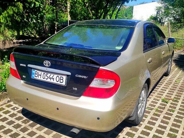 Бежевый Тойота Камри, объемом двигателя 3 л и пробегом 360 тыс. км за 3600 $, фото 1 на Automoto.ua