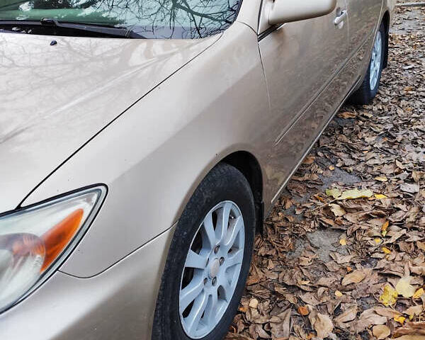 Бежевий Тойота Камрі, об'ємом двигуна 2.4 л та пробігом 290 тис. км за 5800 $, фото 3 на Automoto.ua