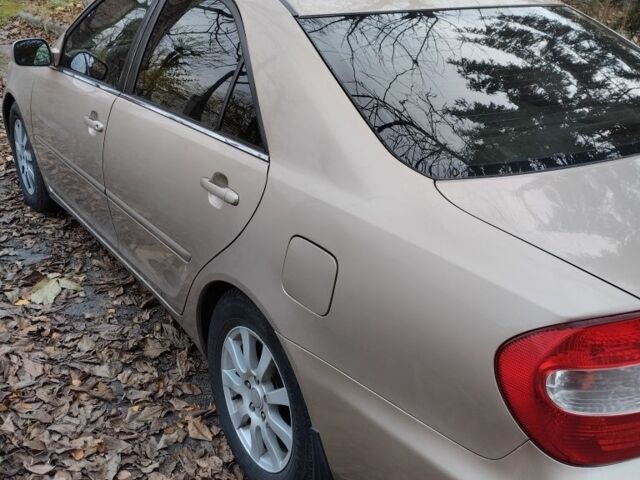 Бежевый Тойота Камри, объемом двигателя 2.4 л и пробегом 290 тыс. км за 5800 $, фото 5 на Automoto.ua