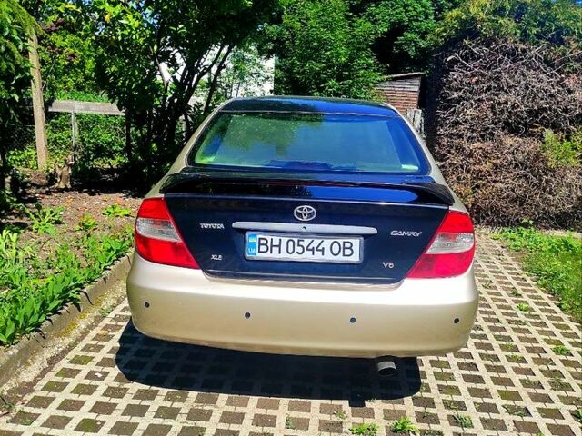 Бежевый Тойота Камри, объемом двигателя 3 л и пробегом 360 тыс. км за 3600 $, фото 2 на Automoto.ua