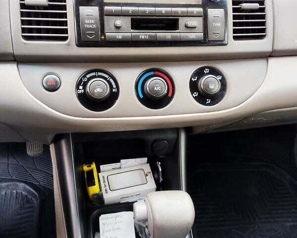 Бежевий Тойота Камрі, об'ємом двигуна 2.4 л та пробігом 290 тис. км за 5800 $, фото 14 на Automoto.ua