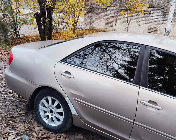 Бежевий Тойота Камрі, об'ємом двигуна 2.4 л та пробігом 290 тис. км за 5800 $, фото 6 на Automoto.ua