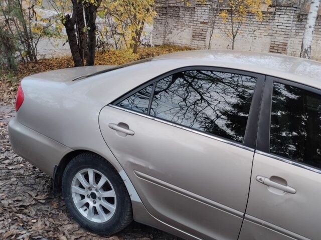 Бежевый Тойота Камри, объемом двигателя 2.4 л и пробегом 290 тыс. км за 5800 $, фото 3 на Automoto.ua