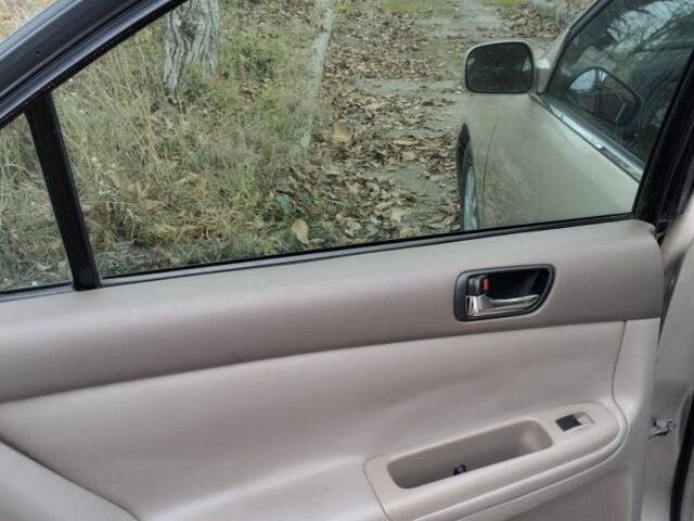 Бежевый Тойота Камри, объемом двигателя 2.4 л и пробегом 290 тыс. км за 5800 $, фото 17 на Automoto.ua