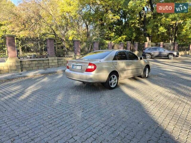 Бежевий Тойота Камрі, об'ємом двигуна 3 л та пробігом 438 тис. км за 5500 $, фото 8 на Automoto.ua