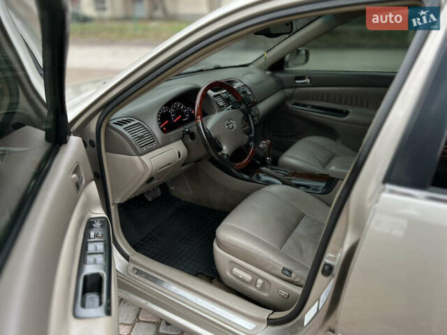 Бежевый Тойота Камри, объемом двигателя 2.4 л и пробегом 354 тыс. км за 4900 $, фото 10 на Automoto.ua