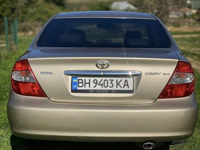 Бежевий Тойота Камрі, об'ємом двигуна 2.36 л та пробігом 231 тис. км за 6300 $, фото 3 на Automoto.ua