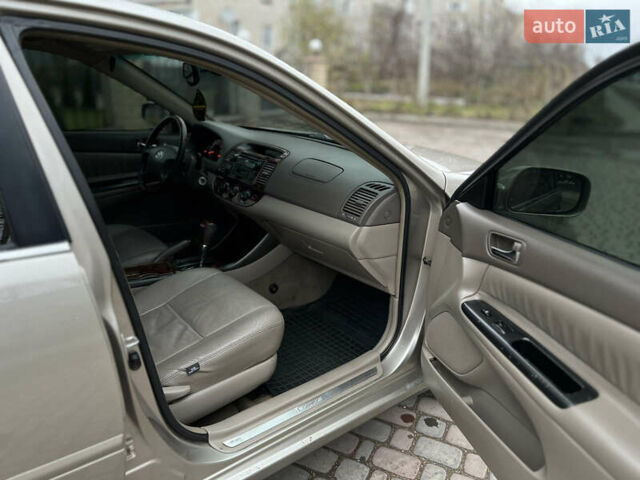 Бежевый Тойота Камри, объемом двигателя 2.4 л и пробегом 354 тыс. км за 4900 $, фото 13 на Automoto.ua