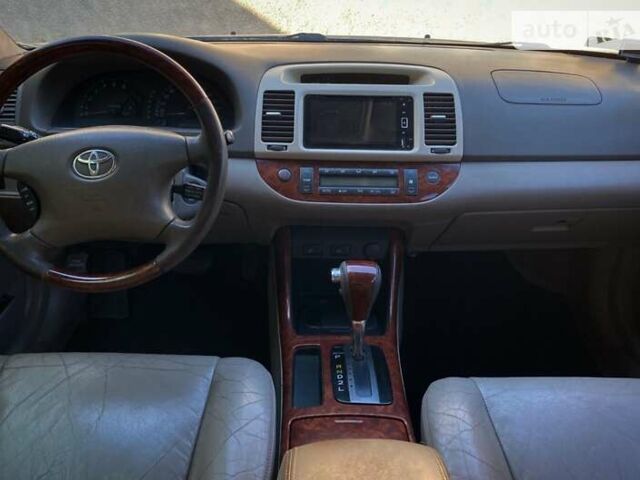 Бежевий Тойота Камрі, об'ємом двигуна 2.36 л та пробігом 231 тис. км за 6300 $, фото 5 на Automoto.ua