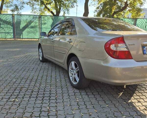 Бежевий Тойота Камрі, об'ємом двигуна 3 л та пробігом 438 тис. км за 5500 $, фото 21 на Automoto.ua