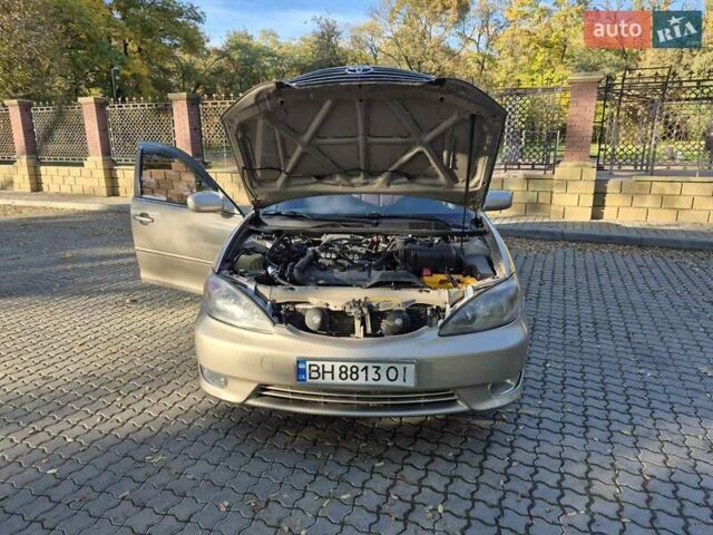 Бежевий Тойота Камрі, об'ємом двигуна 3 л та пробігом 438 тис. км за 5500 $, фото 27 на Automoto.ua