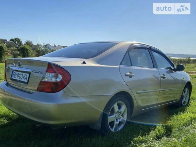 Бежевий Тойота Камрі, об'ємом двигуна 2.36 л та пробігом 231 тис. км за 6300 $, фото 1 на Automoto.ua