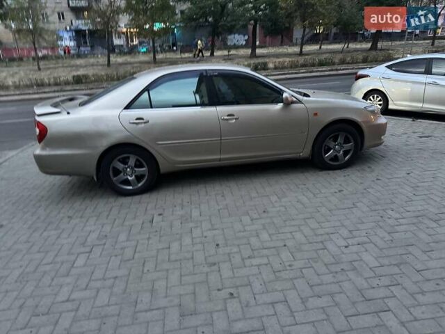 Бежевый Тойота Камри, объемом двигателя 3 л и пробегом 384 тыс. км за 4700 $, фото 4 на Automoto.ua