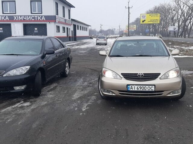 Бежевый Тойота Камри, объемом двигателя 2.4 л и пробегом 230 тыс. км за 5500 $, фото 2 на Automoto.ua