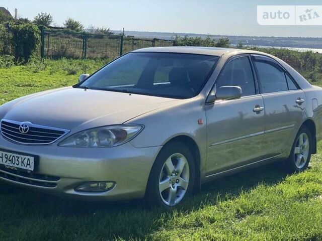 Бежевий Тойота Камрі, об'ємом двигуна 2.36 л та пробігом 231 тис. км за 6300 $, фото 4 на Automoto.ua