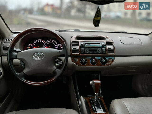 Бежевый Тойота Камри, объемом двигателя 2.4 л и пробегом 354 тыс. км за 4900 $, фото 14 на Automoto.ua