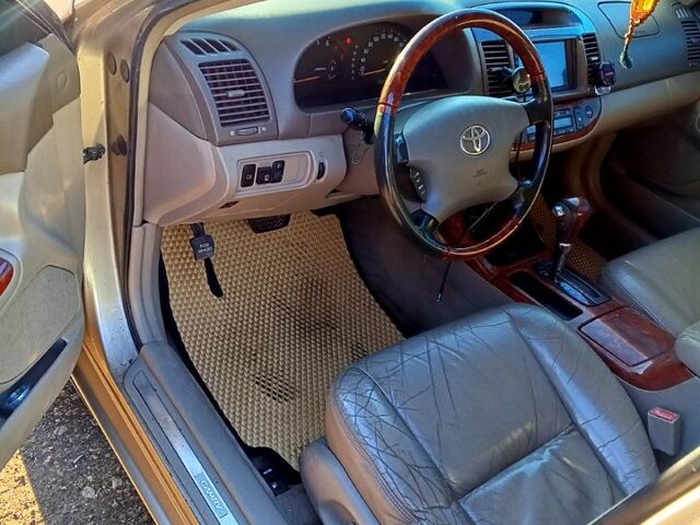 Бежевый Тойота Камри, объемом двигателя 2.4 л и пробегом 266 тыс. км за 5500 $, фото 9 на Automoto.ua