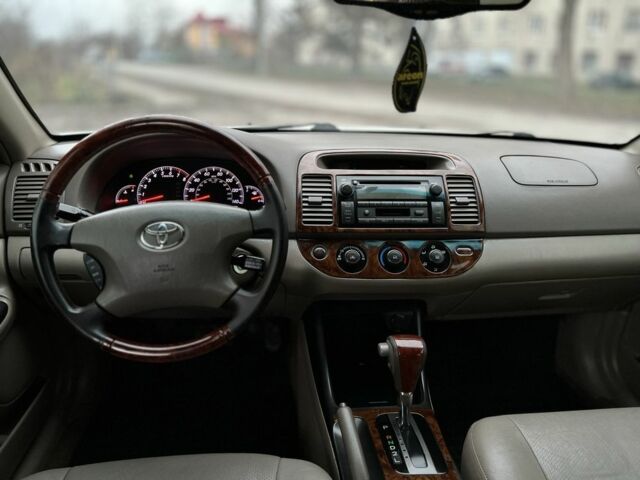 Бежевий Тойота Камрі, об'ємом двигуна 2.4 л та пробігом 354 тис. км за 4900 $, фото 6 на Automoto.ua