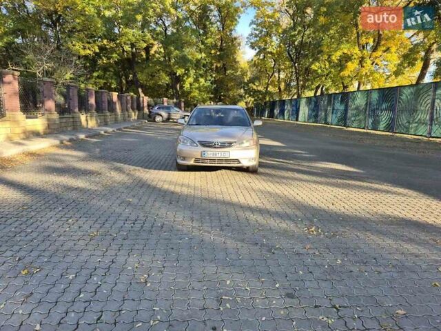 Бежевий Тойота Камрі, об'ємом двигуна 3 л та пробігом 438 тис. км за 5500 $, фото 16 на Automoto.ua