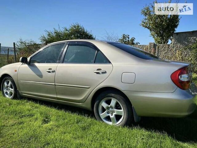 Бежевий Тойота Камрі, об'ємом двигуна 2.36 л та пробігом 231 тис. км за 6300 $, фото 2 на Automoto.ua