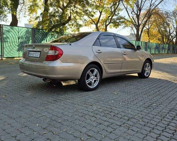 Бежевий Тойота Камрі, об'ємом двигуна 3 л та пробігом 438 тис. км за 5500 $, фото 6 на Automoto.ua