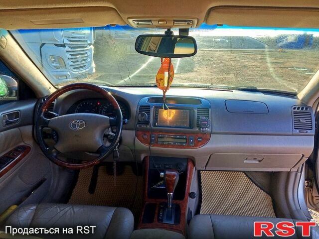 Бежевый Тойота Камри, объемом двигателя 2.4 л и пробегом 266 тыс. км за 5500 $, фото 8 на Automoto.ua