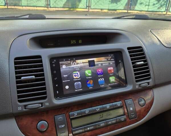 Бежевий Тойота Камрі, об'ємом двигуна 3 л та пробігом 438 тис. км за 5500 $, фото 31 на Automoto.ua