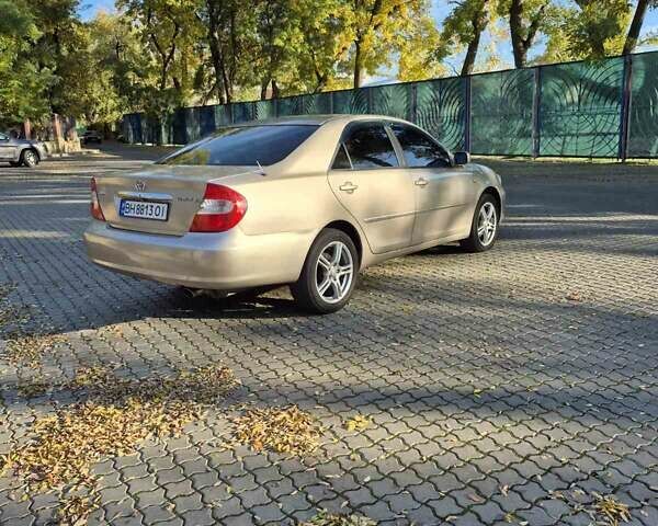 Бежевий Тойота Камрі, об'ємом двигуна 3 л та пробігом 438 тис. км за 5500 $, фото 14 на Automoto.ua