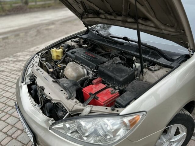 Бежевий Тойота Камрі, об'ємом двигуна 2.4 л та пробігом 354 тис. км за 4900 $, фото 7 на Automoto.ua