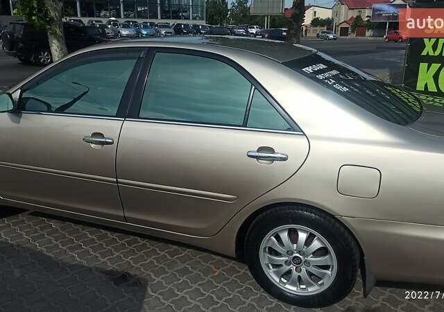 Бежевий Тойота Камрі, об'ємом двигуна 2.4 л та пробігом 200 тис. км за 7200 $, фото 2 на Automoto.ua