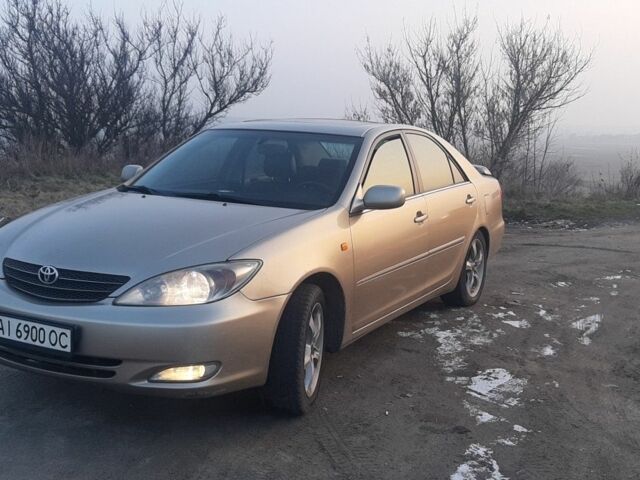 Бежевый Тойота Камри, объемом двигателя 2.4 л и пробегом 230 тыс. км за 5500 $, фото 1 на Automoto.ua